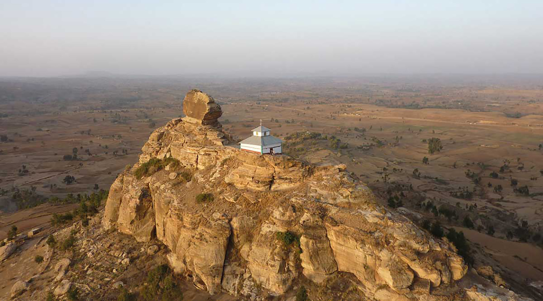 A small church on a rocky hill in Gheralta, Ethiopia