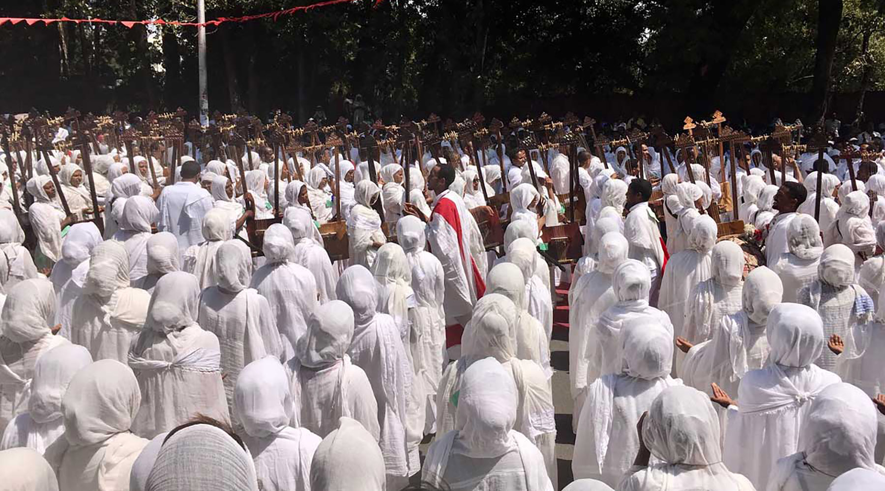 People attending a parade during a religious festival in Ethiopia
